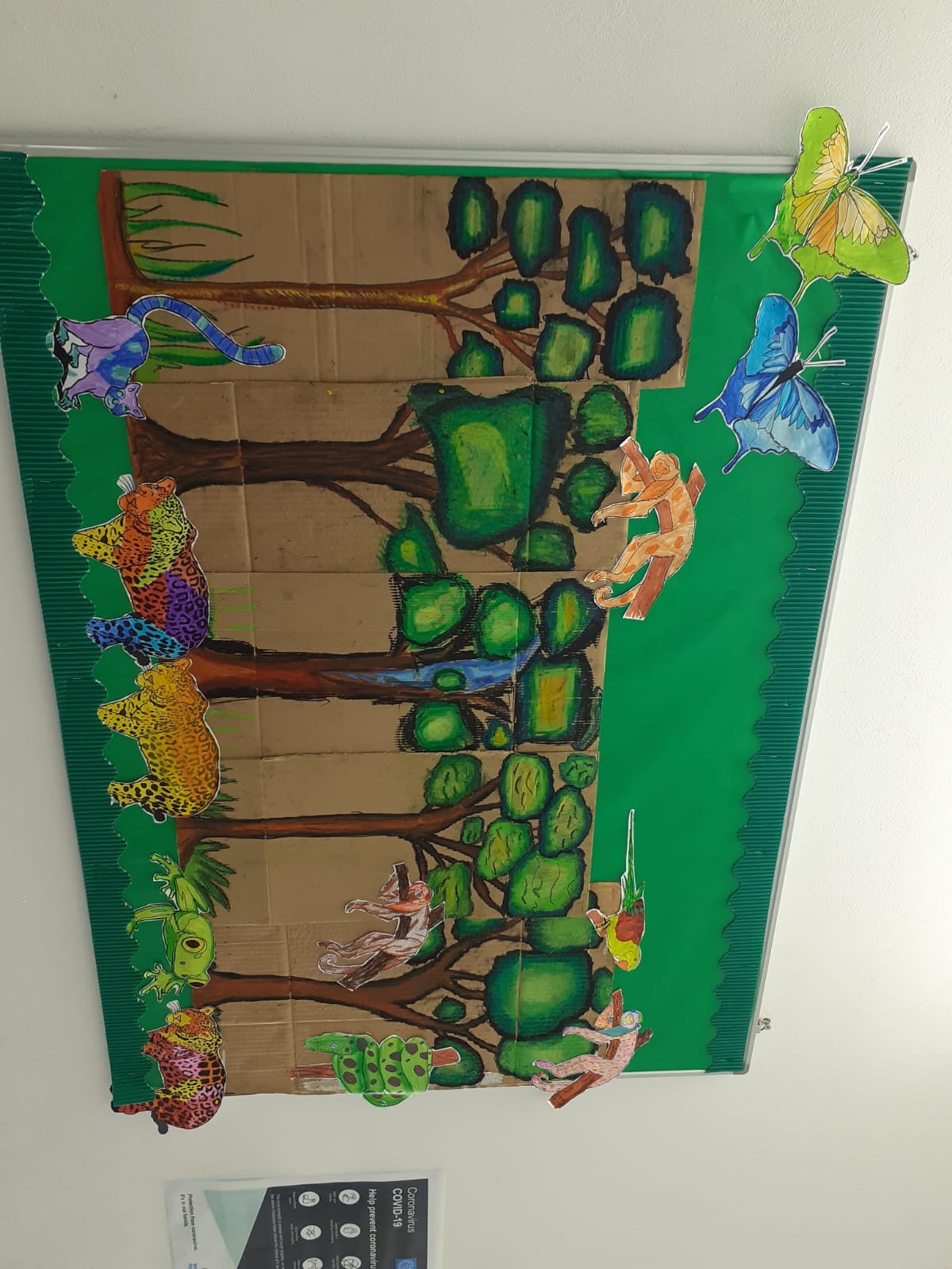 Jungle cardboard display with trees, animals and butterflies
