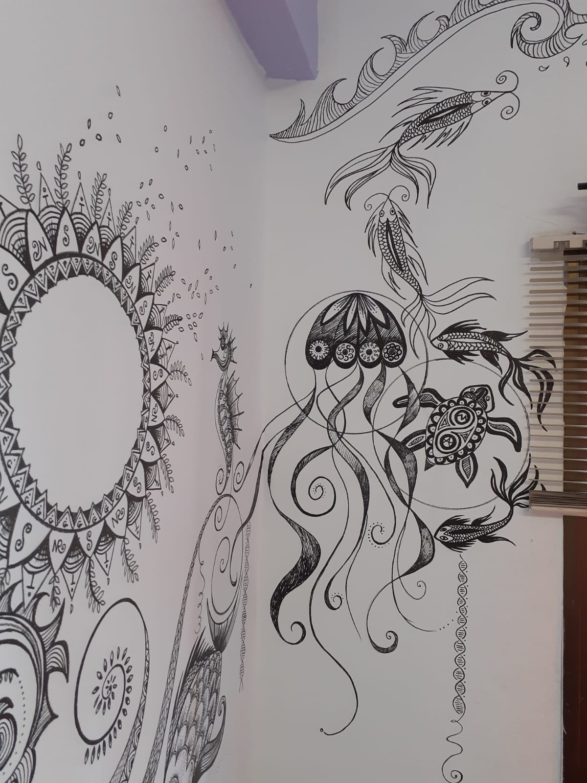 Black and white sea themed wall doodles with jellyfish and fish