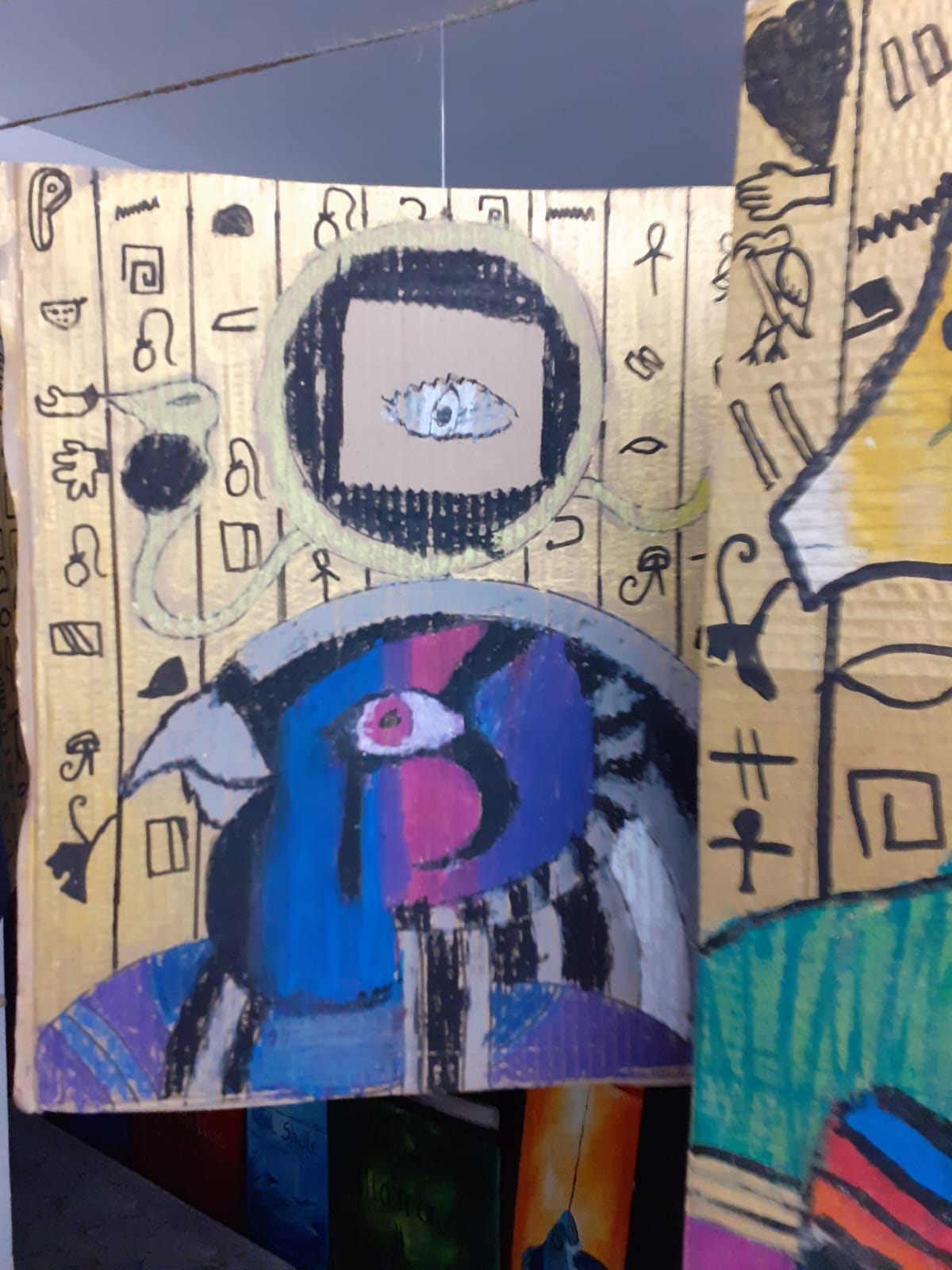Egyptian style painted portrait artwork on cardboard