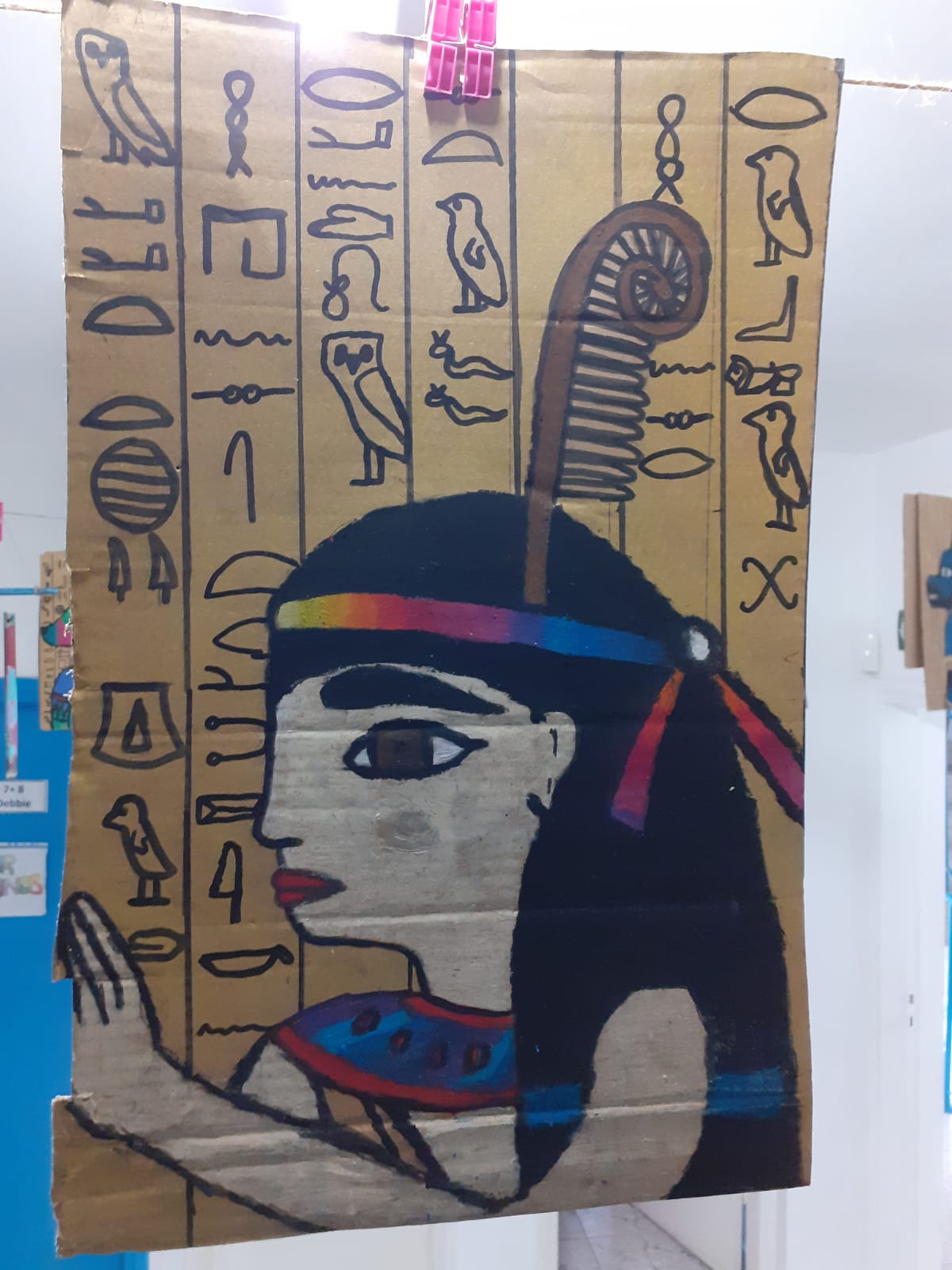 Egyptian style profile portrait artwork on cardboard
